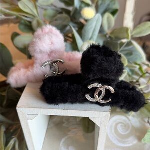 Set of 2 designer inspiredhair clips 5 in long. New without tags